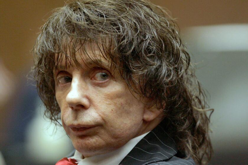 This July 29, 2008, file photo shows music producer Phil Spector during a hearing in Los Angeles County Superior Court. Opening statements are set for Wednesday, Oct. 29, 2008, in the murder retrial of Spector, who is accused of killing actress Lana Clarkson at his home in 2003. (AP Photo/Nick Ut) ORG XMIT: LA102