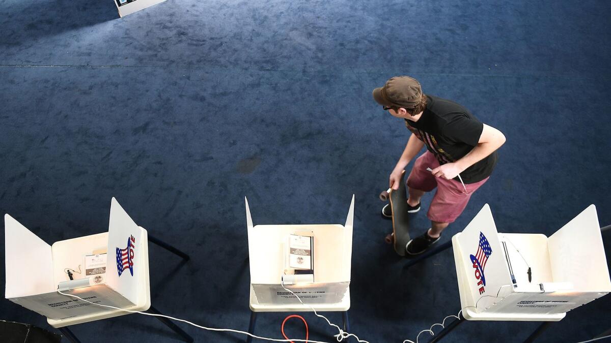 A lone voter at the Cornerstone Theater Co. in the Arts District on March 7.