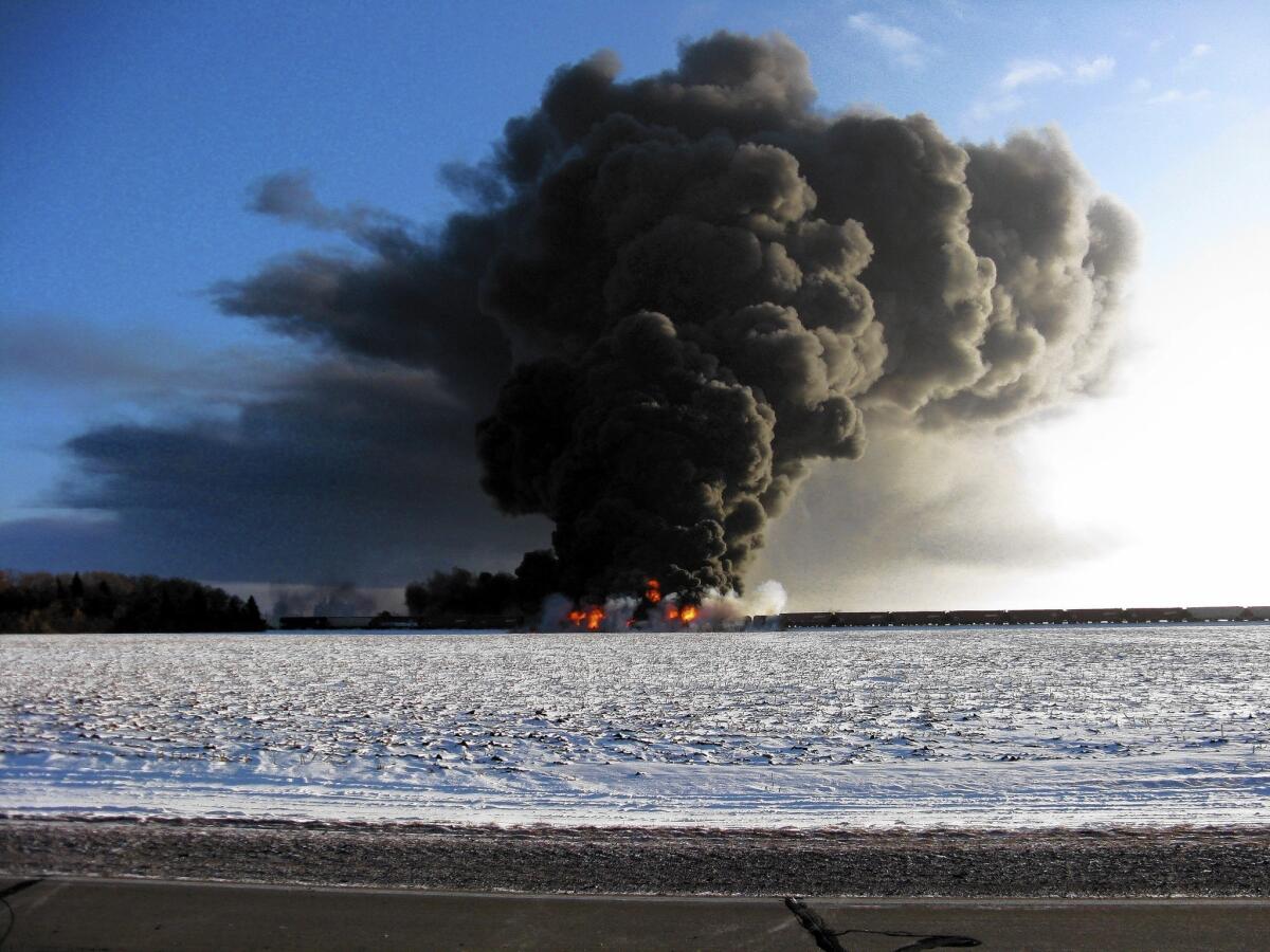 Two trains collided near Casselton, N.D., about 20 miles west of Fargo, prompting an explosion and fire. One train was carrying crude oil, so Casselton was evacuated amid concerns about toxic smoke.