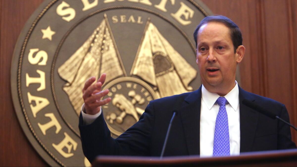 Florida Senate President Joe Negron talks to members in the chamber in Tampa, Fla., Wednesday, March 8, 2017.