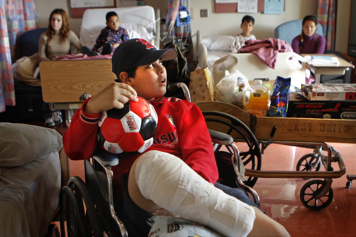 With a new soccer ball and baseball cap, Abdullah Alathamna, then 11, was packed and ready to leave Shriners Hospital for Children in Los Angeles on March 19, 2010.