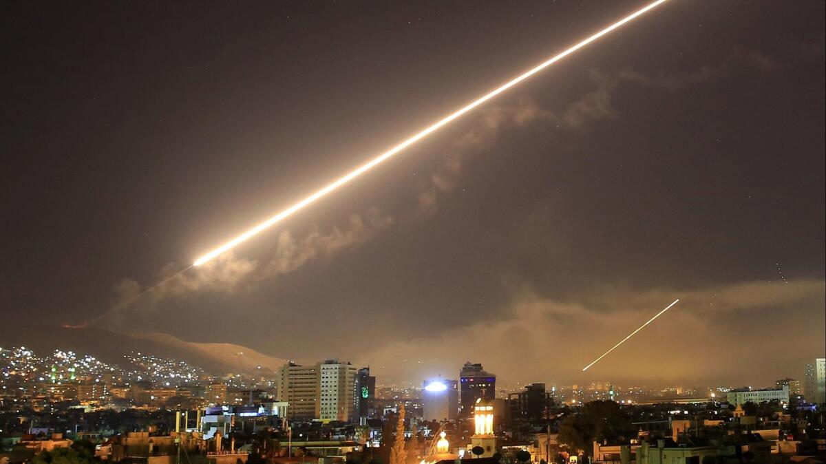 Damascus skies erupt with service to air missile fire as the U.S. launches an attack on the Syrian capital Damascus, Syria on April 14.