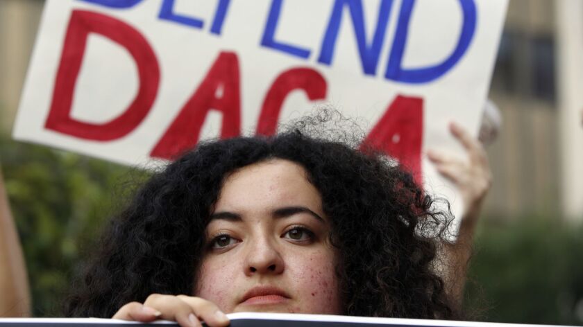 A Dreamer rallies outside the Edward Royal Federal Building in Los Angeles.