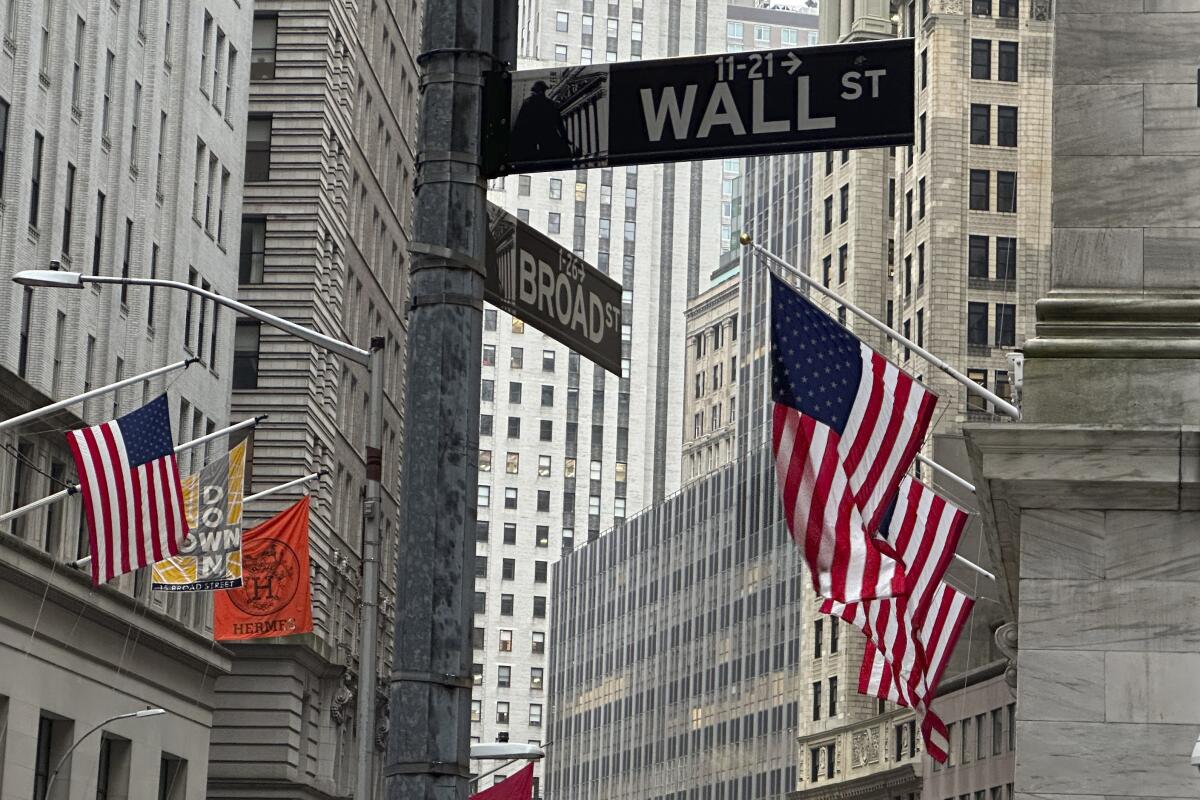 U.S. flags hang outside the New York Stock Exchange