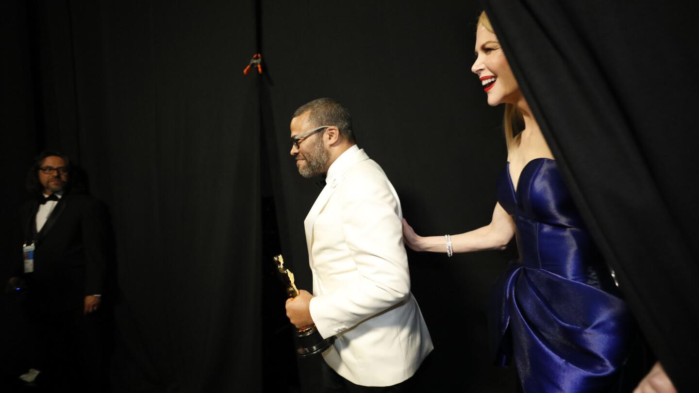 Jordan Peele and Nicole Kidman backstage at the 90th Academy Awards on Sunday at the Dolby Theatre in Hollywood.