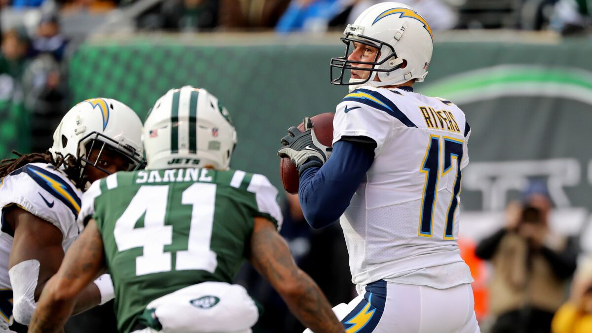 Chargers quarterback Philip Rivers tries to locate a receiver from the pocket during Sunday's game against the Jets.