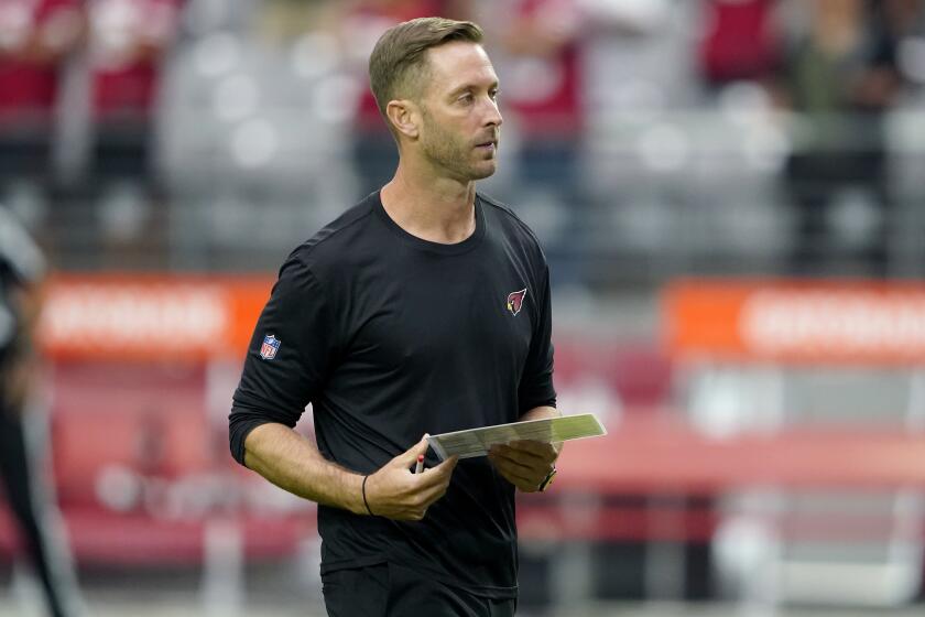 Arizona Cardinals coach Kliff Kingsbury before a game against San Francisco on Oct. 10, 2021, in Glendale, Ariz.