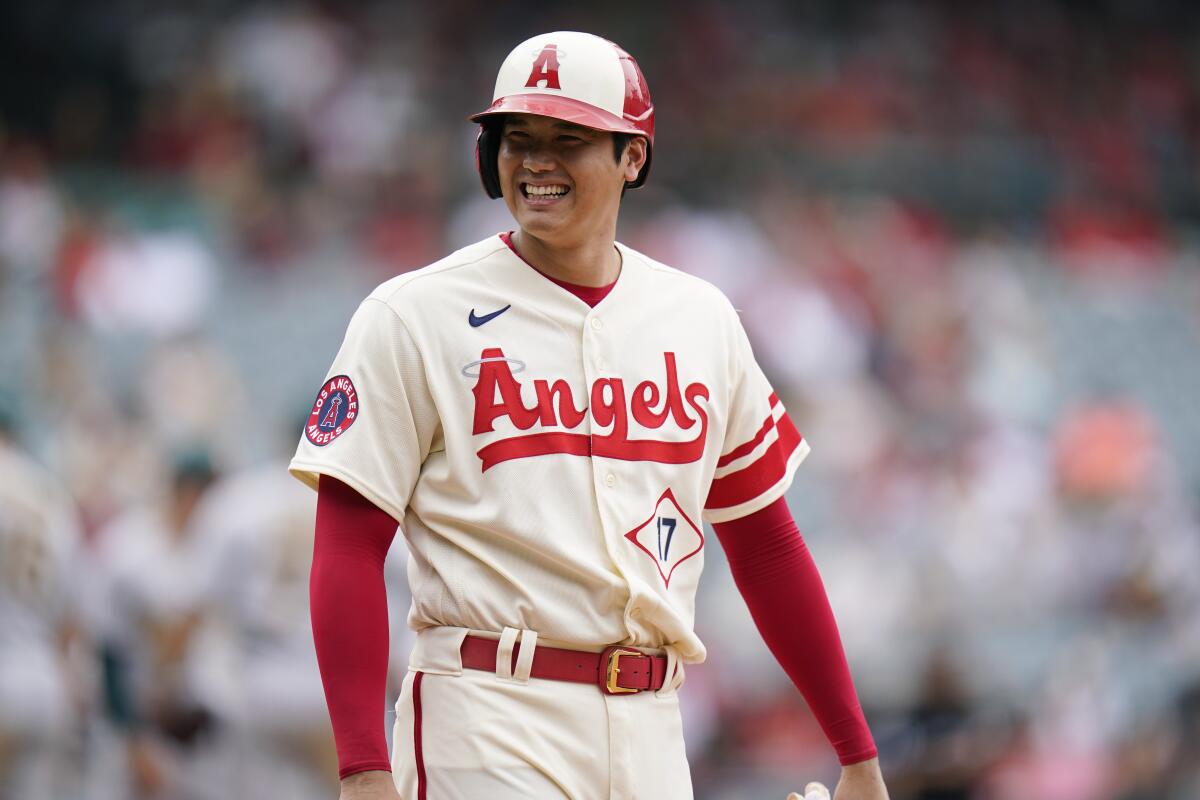 Shohei Ohtani smiles after hitting a single during the fifth inning Thursday.