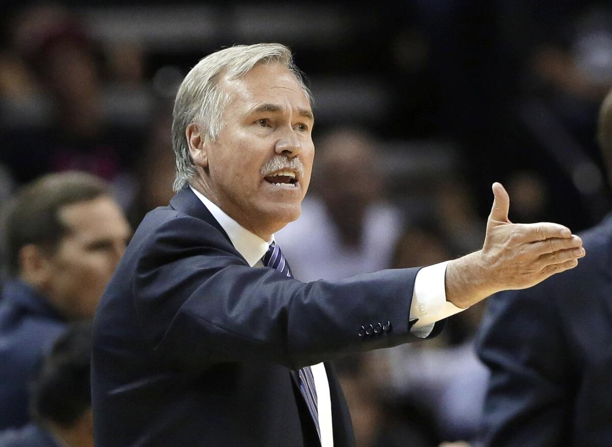 Lakers Coach Mike D'Antoni argues a call during the second half of a game against the San Antonio Spurs on April 16. D'Antoni's Lakers finished the regular season out of the playoffs with a record of 27-55.