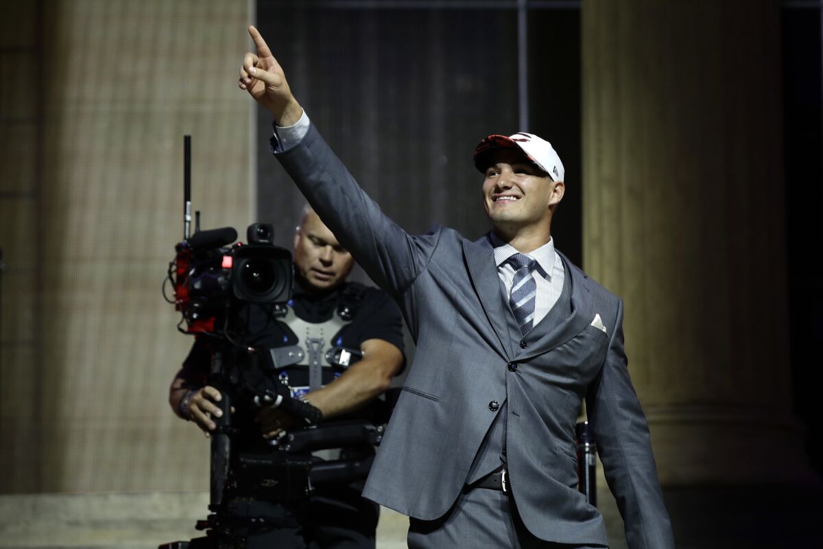 North Carolina quarterback Mitch Trubisky reacts after being selected by the Chicago Bears with the second pick of the NFL draft.