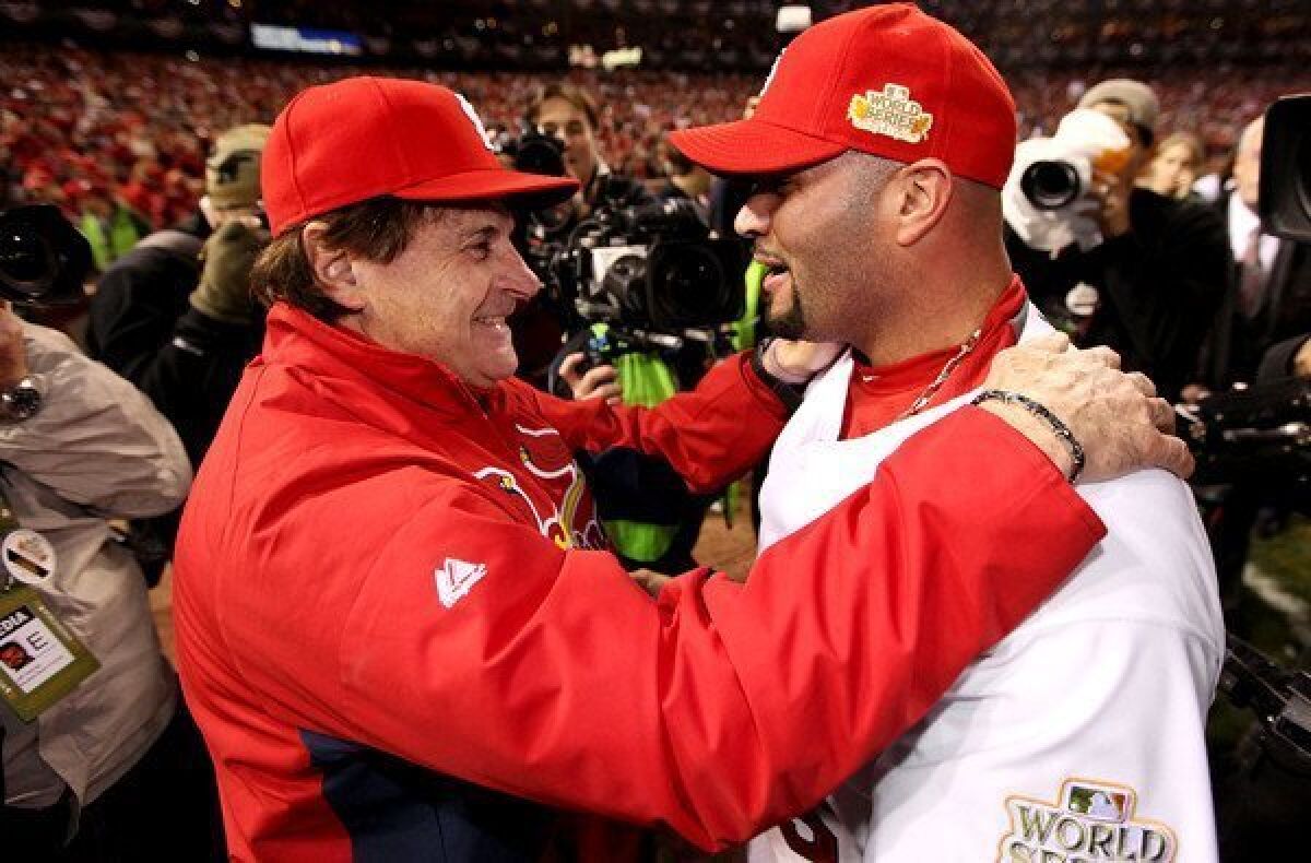 When Tony La Russa was last seen managing, slugger Albert Pujols and the Cardinals were winning the 2011 World Series.