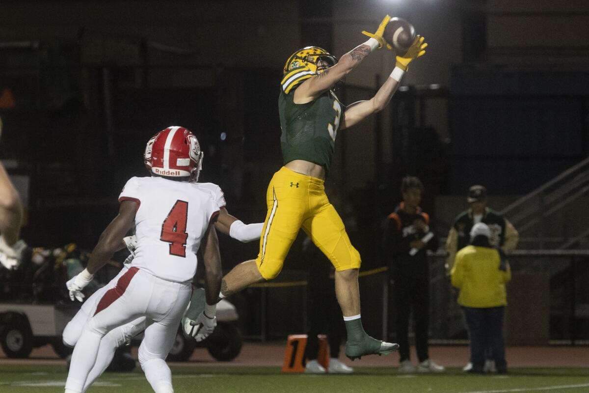 Edison's Ashton Hurley catches the ball for a first down against Orange Lutheran during Friday's game.