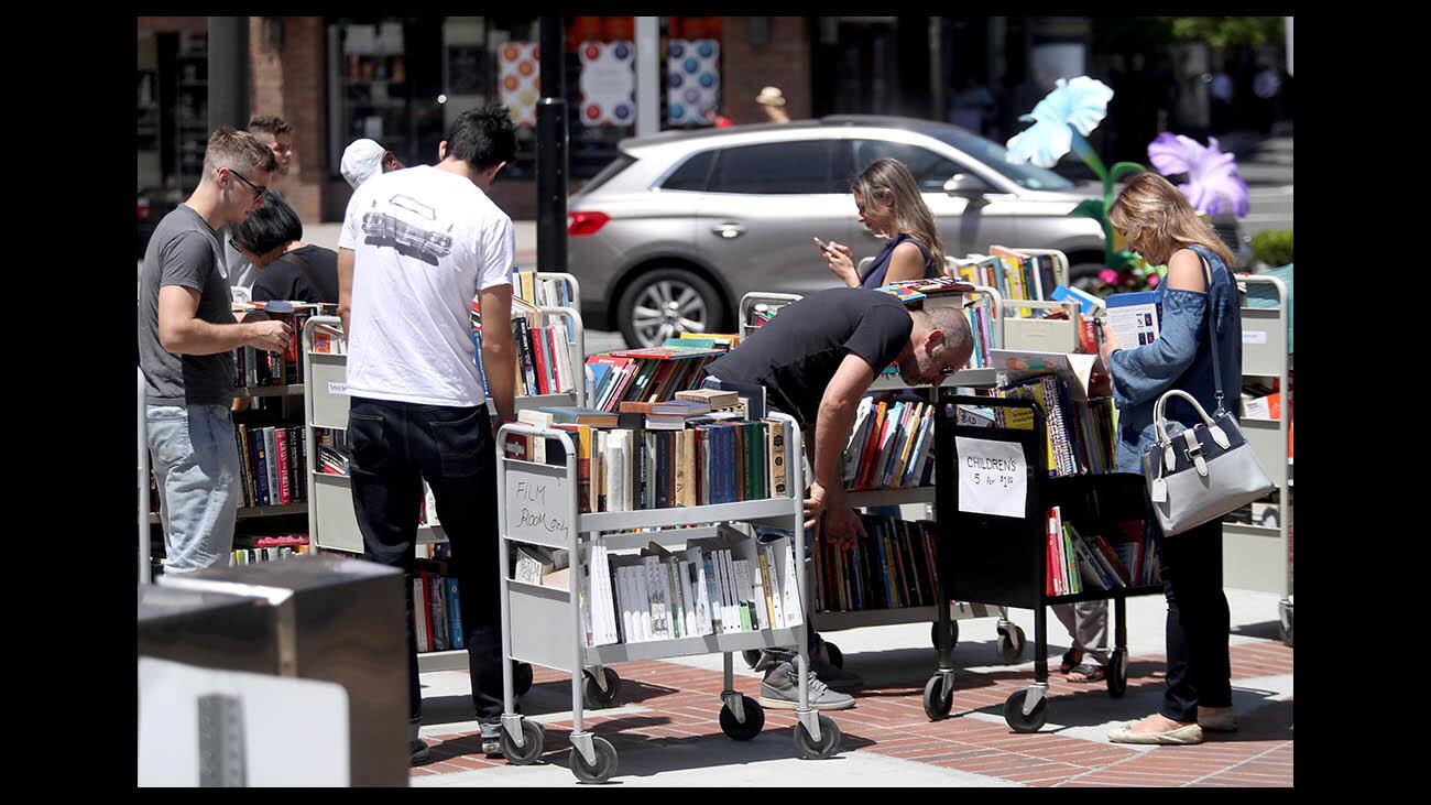 Photo Gallery: Book sale and live music at the MONA paseo on Brand