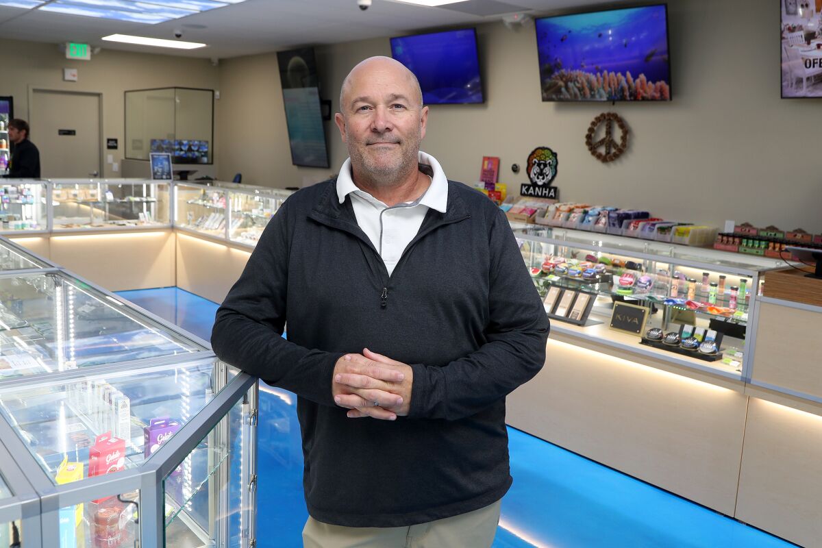 Owner Robert Taft Jr. stands inside his newly opened 420 Central Newport Mesa store on Wednesday in Costa Mesa.