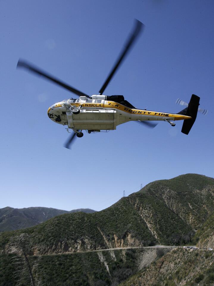 Photo Gallery: Vehicle found over the edge in Angeles National Forest