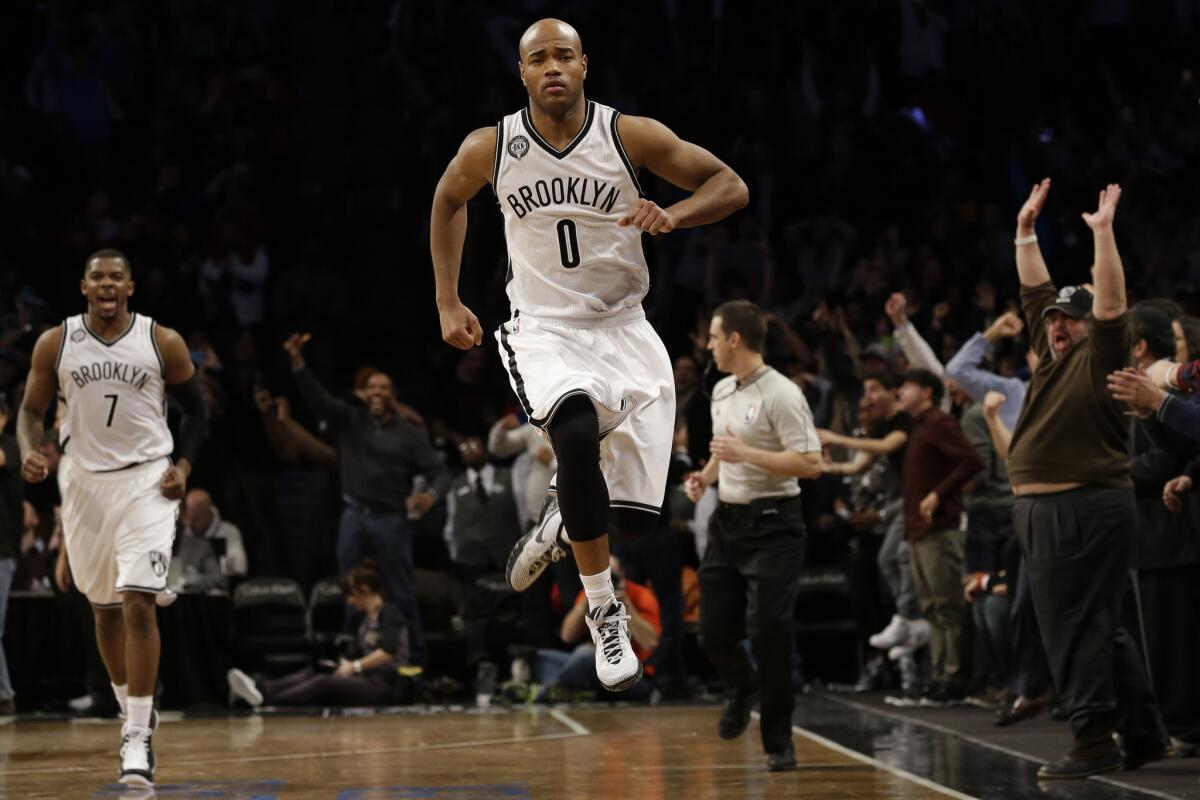 Nets guard Jarrett Jack celebrates his game-winning basket against the Clippers.