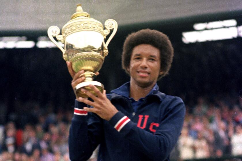 Arthur Ashe at Wimbledon in 1975.