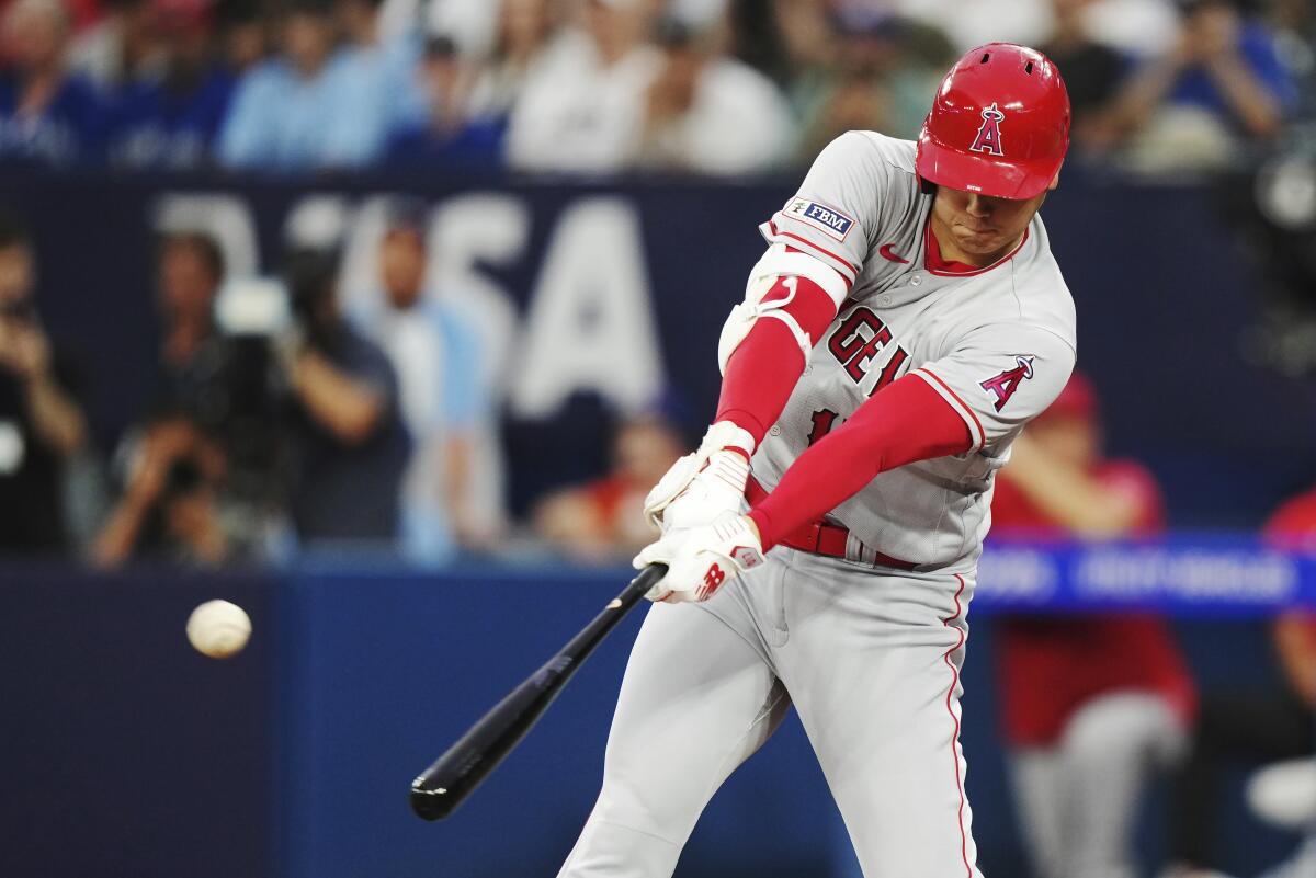 Angels split doubleheader against Jays