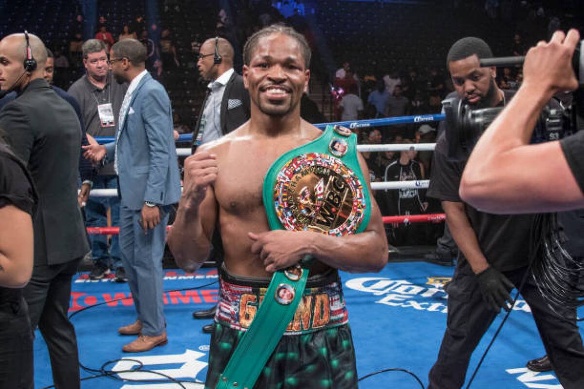 Shawn Porter celebrates after defeating Danny Garcia in a WBC welterweight title bout at the Barclays Center in New York on Sept. 8, 2018.