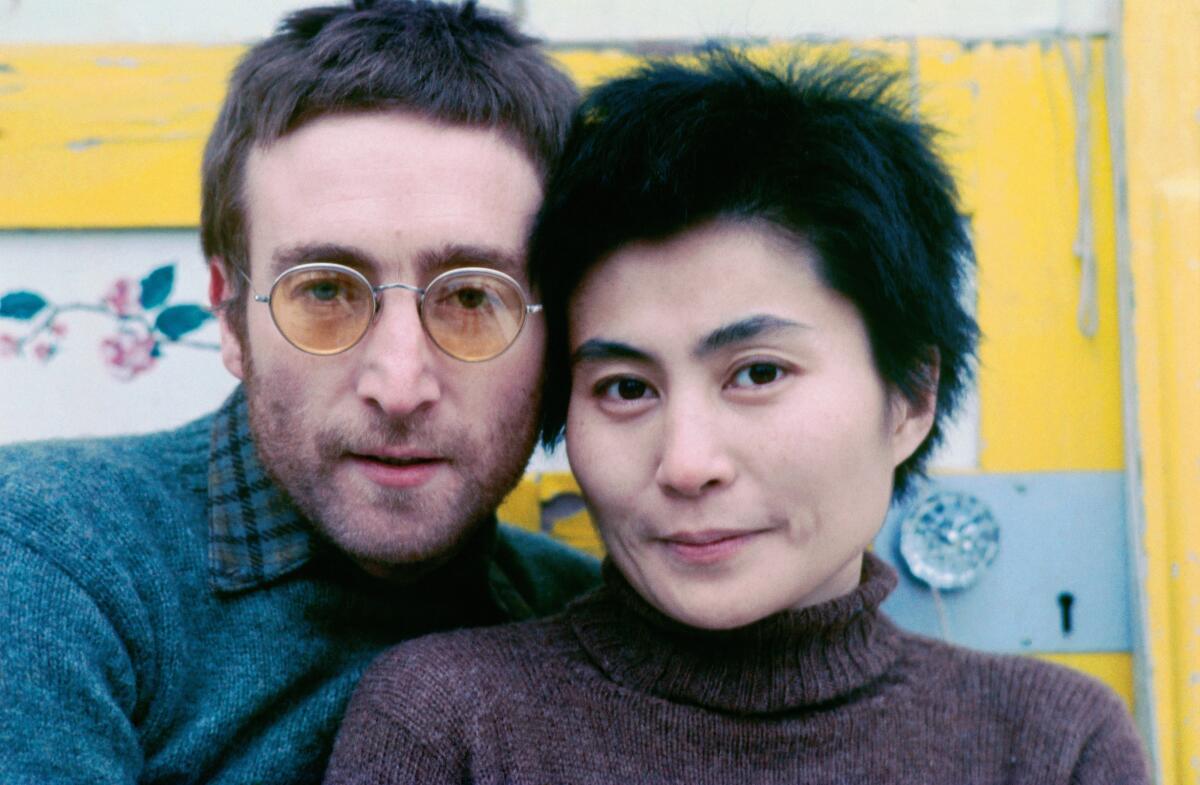 Portrait of John and Yoko in sweaters