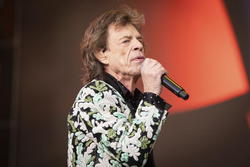 FILE - The Rolling Stones perform live onstage at BST Hyde Park festival, in London, on June 25, 2022. Mick Jagger and his dancer girlfriend Melanie Hamrick have put their Florida home up for sale. A listing on realtor.com on Friday, June 16, 2023, says the lakefront home with four bedrooms and 5.5 baths is listed at $3.499 million. (Photo by Vianney Le Caer/Invision/AP, File)