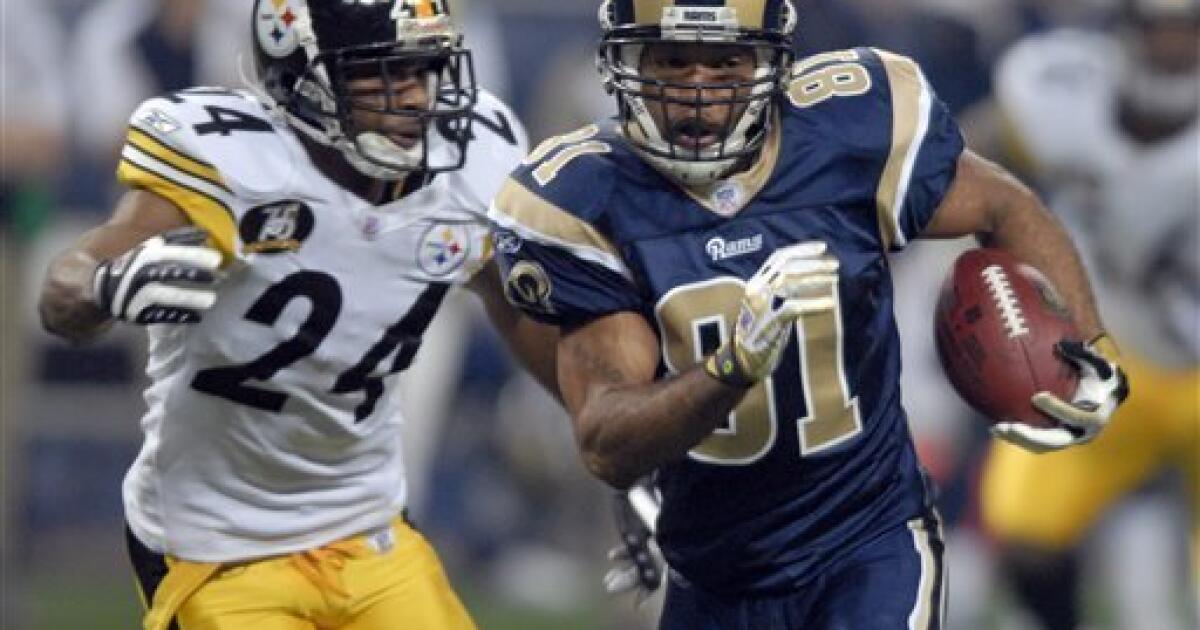 NFL great Torry Holt was 'p——d off' when Rams left St. Louis for LA, hopes  to 'bridge that gap' between cities