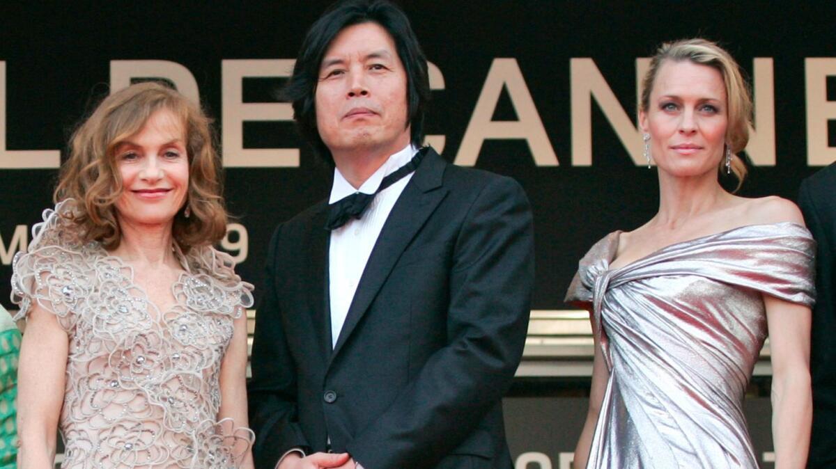 South Korean director Lee Chang-dong, center, with fellow Cannes jury members Isabelle Huppert, left, and Robin Wright at the opening ceremony of the 62nd Cannes Film Festival in 2009.