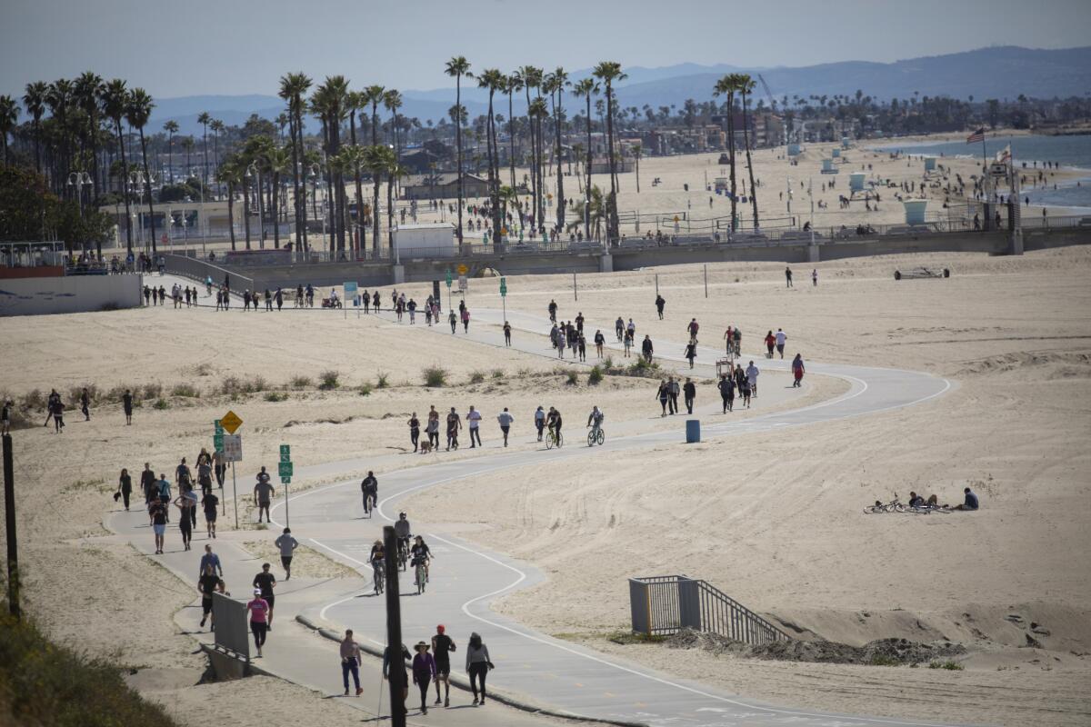 People at Junipero Beach in Long Beach on Sunday