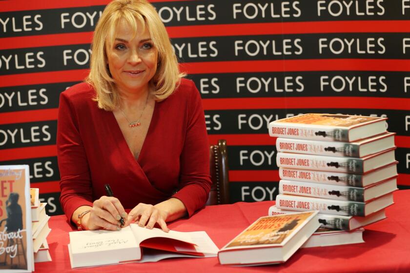 Author Helen Fielding poses for photographs before signing her latest Bridget Jones book "Mad about The Boy" at Foyles bookshop in London, England.