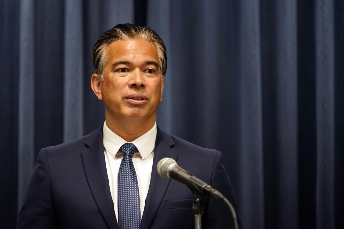 California Attorney General Rob Bonta fields questions during a press conference.