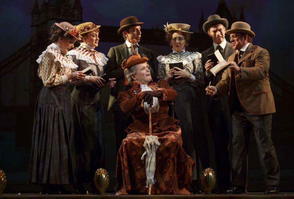 Jefferson Mays, seated center, with the cast during a performance of "A Gentleman's Guide to Love and Murder, " at the Walter Kerr Theatre in New York.