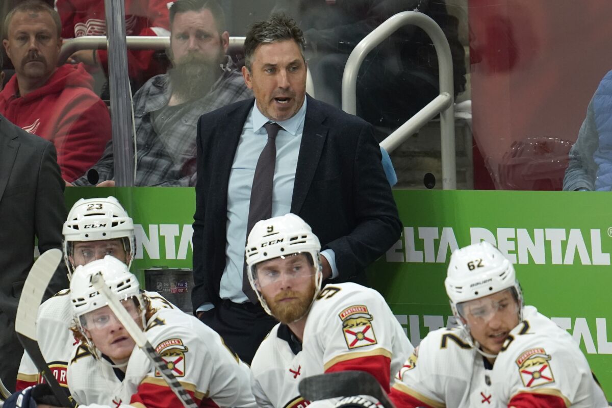 Florida Panthers interim head coach Andrew Brunette watches against the Detroit Red Wings in the second period of an NHL hockey game Friday, Oct. 29, 2021, in Detroit. (AP Photo/Paul Sancya)