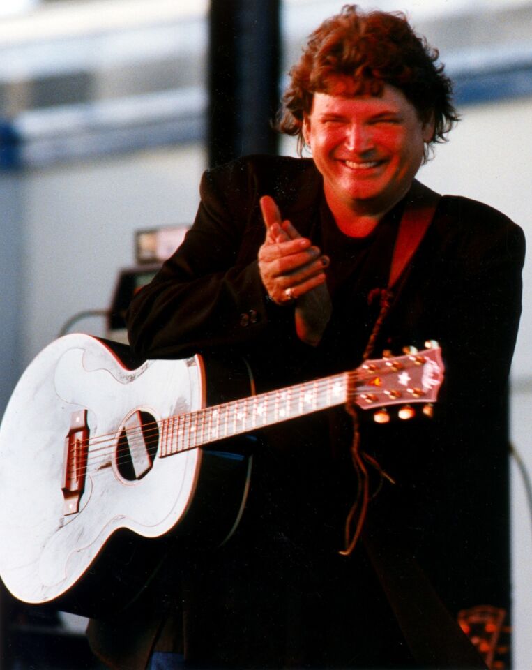 Don Everly of the Everly Brothers performs with his brother Phil at the Orange County Fair in 1992.