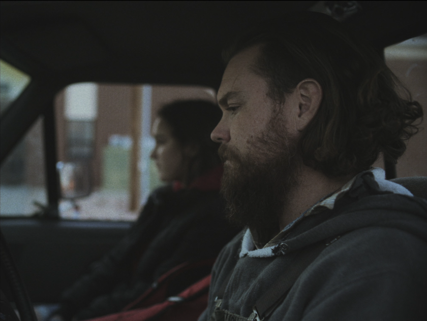 David (played by Clayne Crawford) is behind the wheel of his car; daughter Jess (Avery Pizzuto) is in the passenger seat