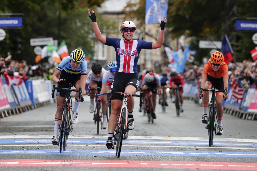 File-This Sept. 27, 2019, file photo shows United States' Megan Jastrab celebrating winning the women junior event at the road cycling World Championships in Harrogate, England. The cycling team that the U.S. is taking to the Tokyo Olympics is a little bit different than the one it would have taken a year ago, when the COVID-19 pandemic forced organizers to postpone the Summer Games by an entire year. Among those on the team announced Thursday, June 10, 2021, are mountain biker Haley Batten, who's been on the podium each of the first two World Cup races of the season; Jastrab, the 19-year-old track cycling prodigy who will be part of the gold medal-favorite women's pursuit team and also contest the Madison; and 23-year-old time trial star Brandon McNulty. (AP Photo/Manu Fernandez, File)