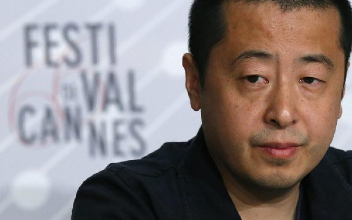 Chinese director Jia Zhangke attends the news conference for "Tian Zhu Ding" (A Touch of Sin) at the 66th annual Cannes Film Festival.