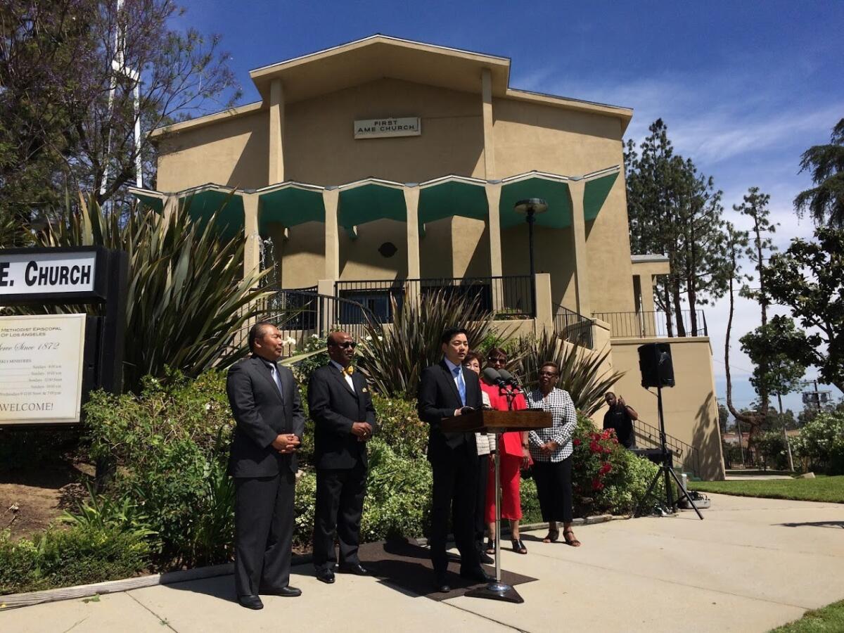 Congressional candidate Robert Lee Ahn speaks at a press conference in front of First AME Church last month.