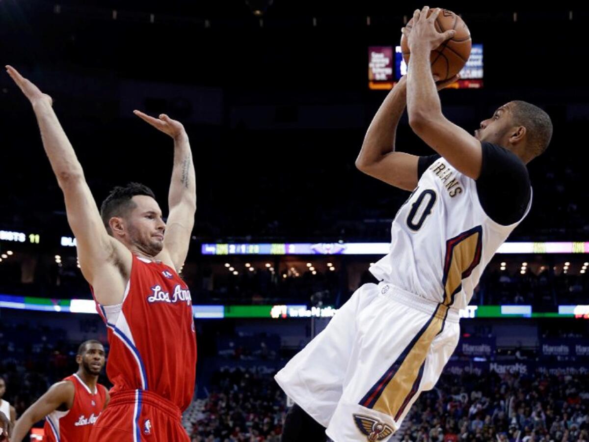 Pelicans guard Eric Gordon shoots a fadeaway jumper over Clippers guard J.J. Redick in the second half.