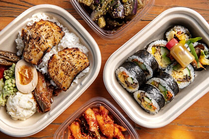 LOS ANGELES, CA - AUGUST 30: (from left) Dosirak - Cod and gimbap from Perilla LA on Wednesday, Aug. 30, 2023 in Los Angeles, CA.(Mariah Tauger / Los Angeles Times)