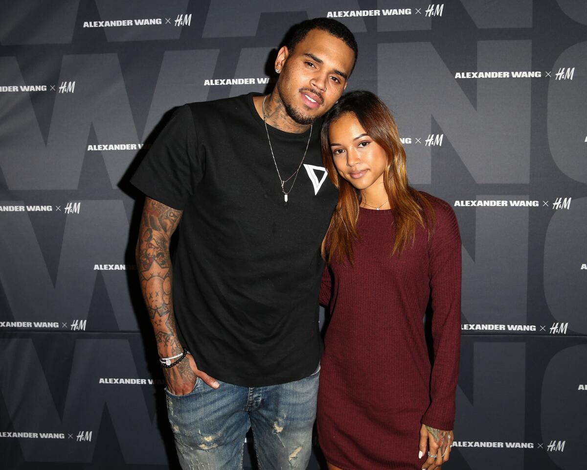 Recording artist Chris Brown and model Karrueche Tran attend a party for Alexander Wang x H&M at H&M on Wednesday in West Hollywood.
