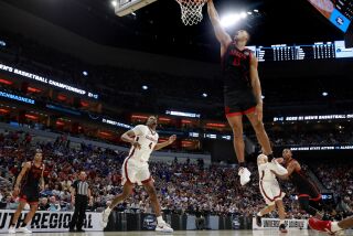 Louisville, KY - March 24: San Diego State's Jaedon LeDee slams the ball against Alabama in a Sweet 16 game in the NCAA Tournament on Friday, March 24, 2023 in in Louisville, KY. (K.C. Alfred / The San Diego Union-Tribune)