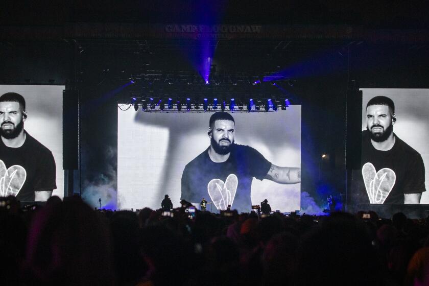 LOS ANGELES, CALIF. -- SUNDAY, NOVEMBER 10, 2019: Drake is seen performing on a large television screen as he performs as one of three mystery guests of Tyler The Creator on the final day of Camp Flog Gnaw Carnival at Dodger Stadium parking lot in Los Angeles, Calif., on Nov. 10, 2019. (Allen J. Schaben / Los Angeles Times)