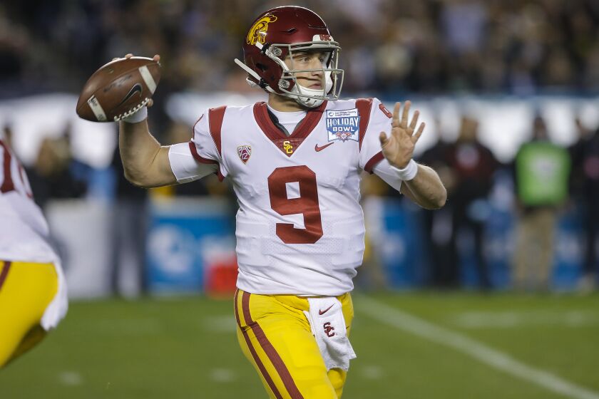 SAN DIEGO, December 27th, 2019 | 2019 San Diego County Credit Union Holiday Bowl between the University of Southern California (USC) Trojans and Iowa Hawkeyes on Friday, December 27th, 2019 at SDCCU Stadium. USC quarterback Kedon Slovis passes in the first quarter against Iowa. Photo by Chadd Cady