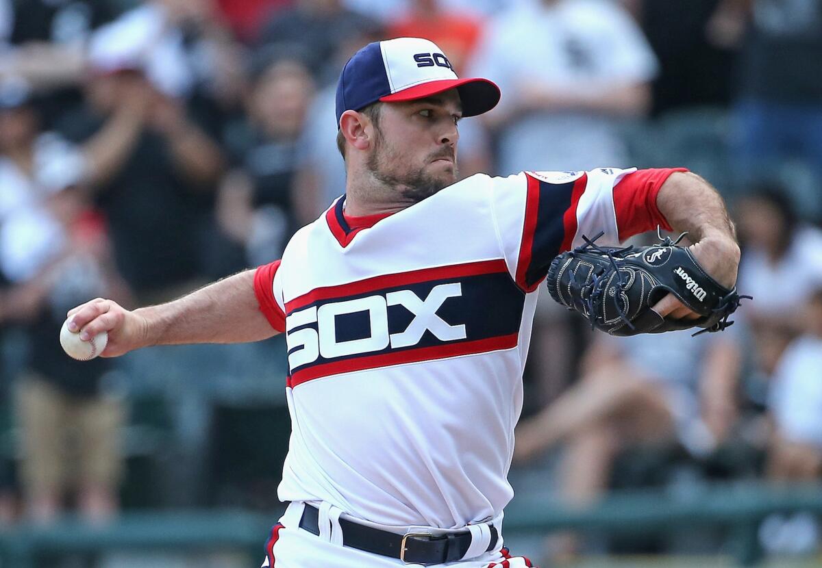 White Sox reliever David Robertson (30) pitches in the ninth inning for a save against the Texas Rangers on Apr. 24.