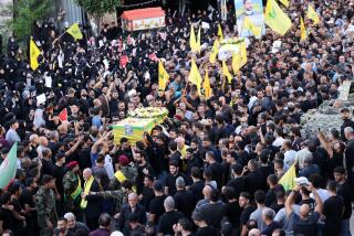 Mourners carry the coffins of people killed after hundreds of paging devices exploded in a deadly wave across Lebanon the previous day, during their funeral procession in Beirut's southern suburbs on September 18, 2024. Hundreds of pagers used by Hezbollah members exploded across Lebanon on September 17, killing at least nine people and wounding around 2,800 in blasts the Iran-backed militant group blamed on Israel. (Photo by ANWAR AMRO / AFP) (Photo by ANWAR AMRO/AFP via Getty Images)