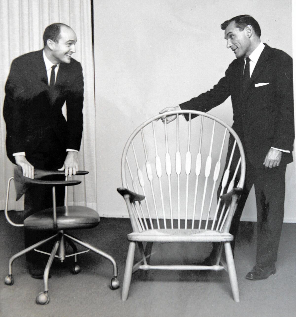 Ron Frank, left, and his uncle, Ed Frank, with pieces of furniture from their cutting-edge Long Beach furnishings store, Frank Bros. The company was founded in 1938 and sold in 1982.