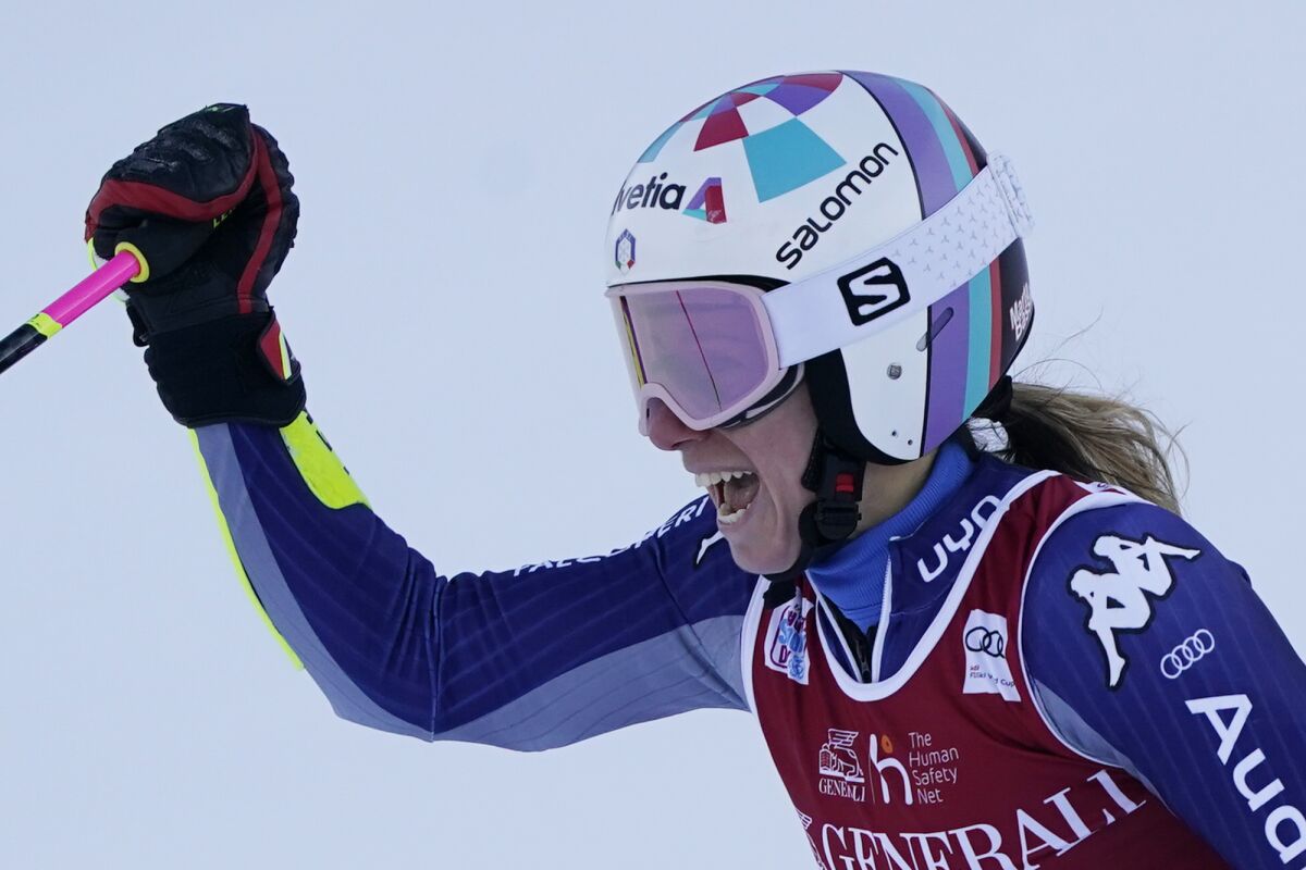 Italy's Marta Bassino reacts after winning an alpine ski, women's World Cup giant slalom, in Kranjska Gora, Slovenia, Saturday, Jan. 16, 2021. (AP Photo/Giovanni Auletta)