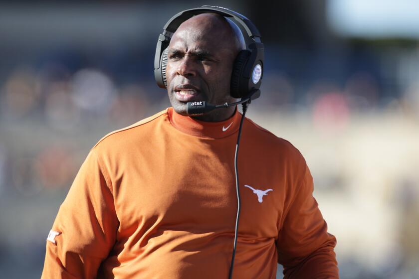Texas head coach Charlie Strong is shown during a game against West Virginia on Nov. 14, 2015.