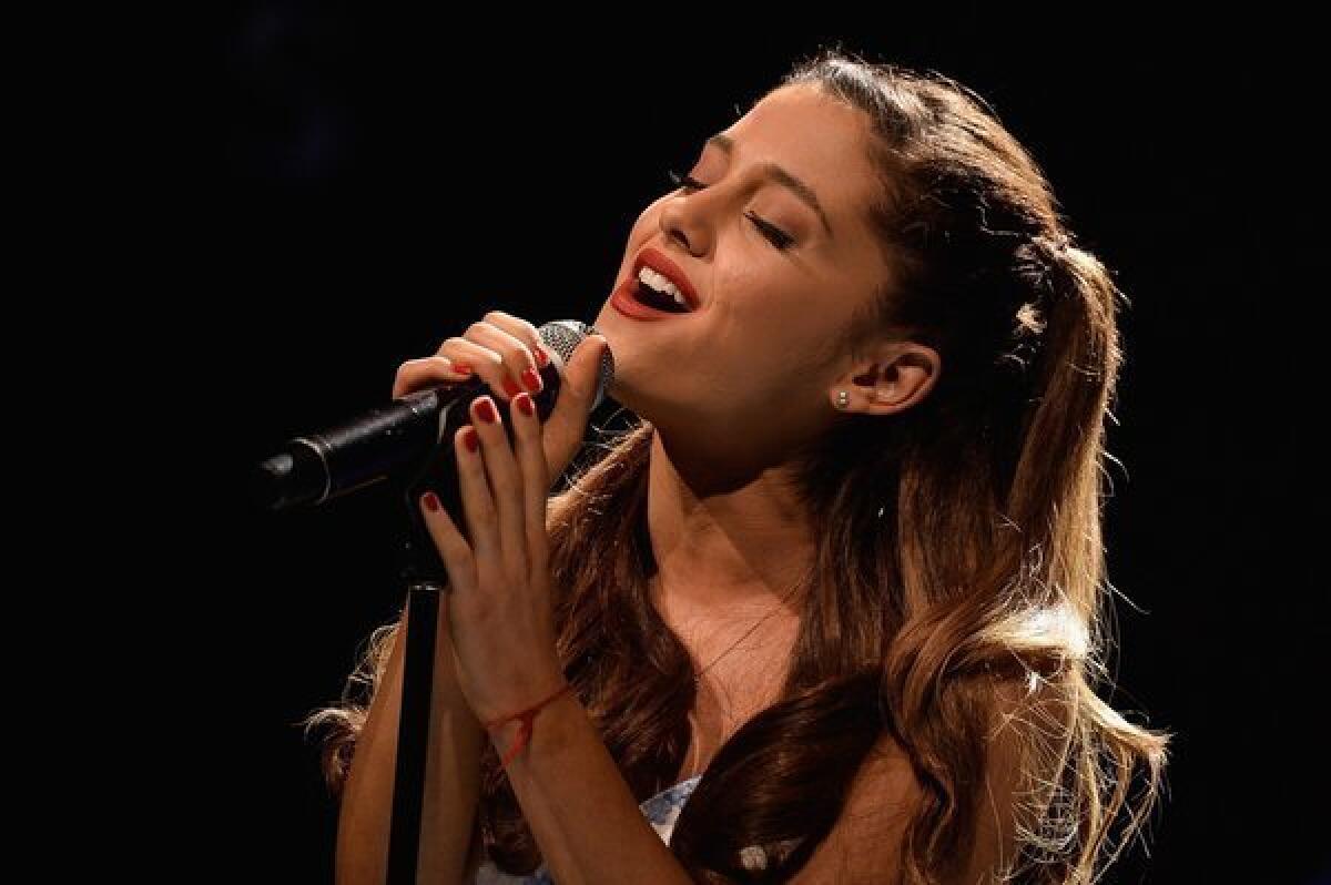 Ariana Grande performed most of her debut album "Yours Truly" at Club Nokia. Here, she's seen performing at Lincoln Center in New York.