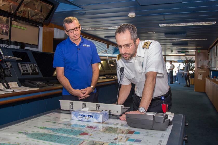 IMAGE DISTRIBUTED FOR ROYAL CARIBBEAN - Royal Caribbean International President & CEO Michael Bayley and Adventure of the Seas Captain Tomas Busto greet Hurricane Maria evacuees on board the ship on Tuesday, Oct. 3, 2017 in Fort Lauderdale, Fla. The cruise line worked with local governments in Puerto Rico, St. Croix and St. Thomas to facilitate the evacuation of approximately 3,400 people and coordinate the delivery of emergency supplies. (Jesus Aranguren/AP Images for Royal Caribbean)